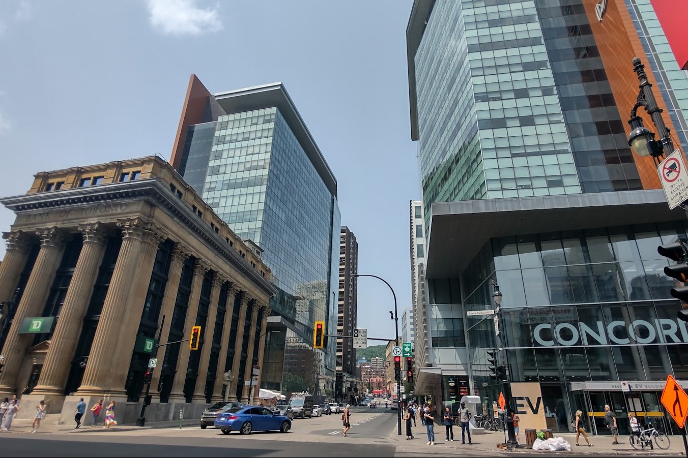 a couple of tall buildings sitting next to each other